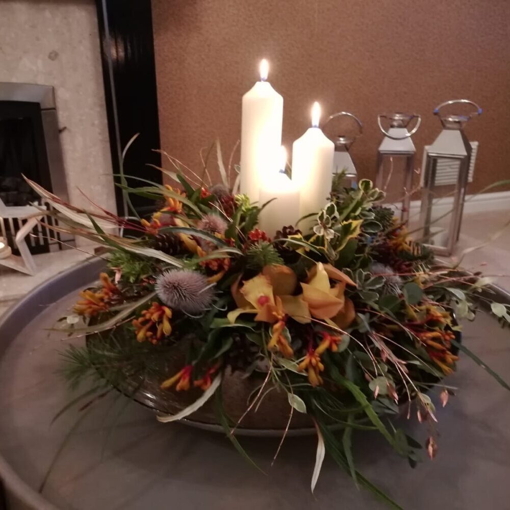 Christmas flowers, Christmas wreath, candles, green yellow orange