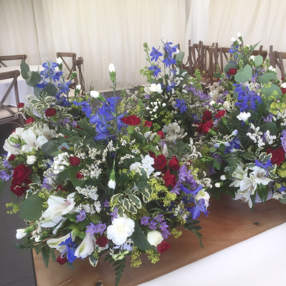 event flowers, wreaths, ivy, green purple red white