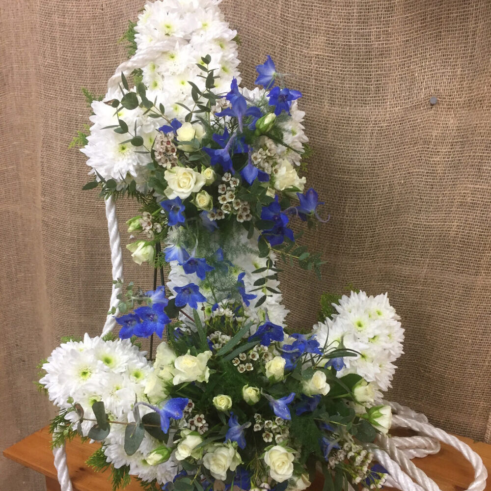 sympathy flowers, funeral, anchor, rope, white purple green