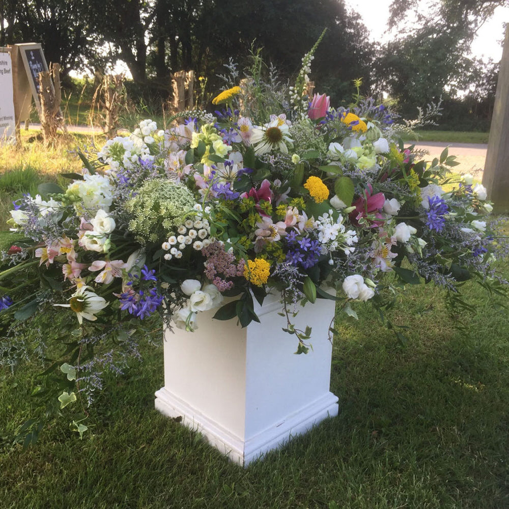 sympathy flowers, funeral, arrangement, yellow purple white green